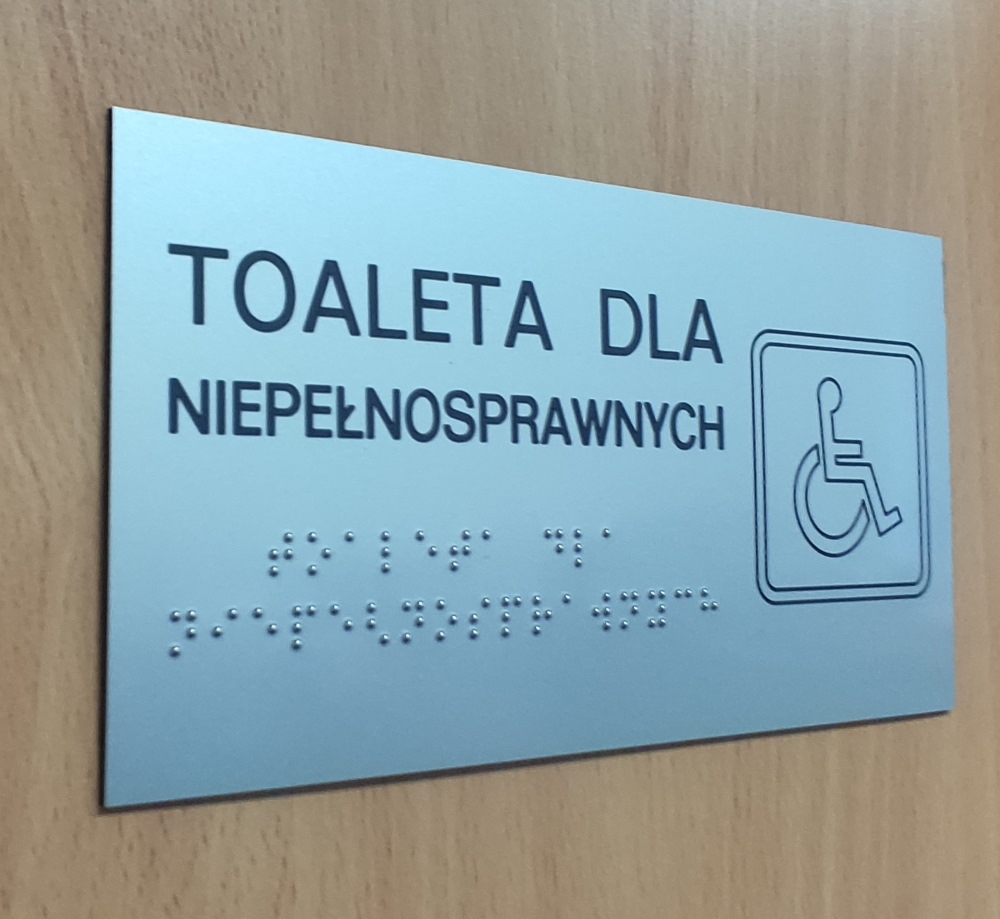 Tabliczka w brajlu Toaleta dla niepełnosprawnych